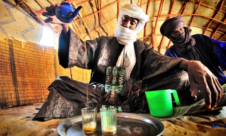 Workers Chai-Tea in West Africa Mali getting ready to be served in a single glass
